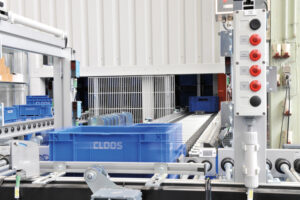 CLOOS spare parts warehouse with organized robotic welding components and supplies