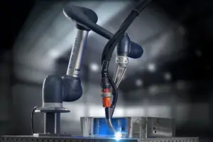 CLOOS ArcBoT welding on fixture table.